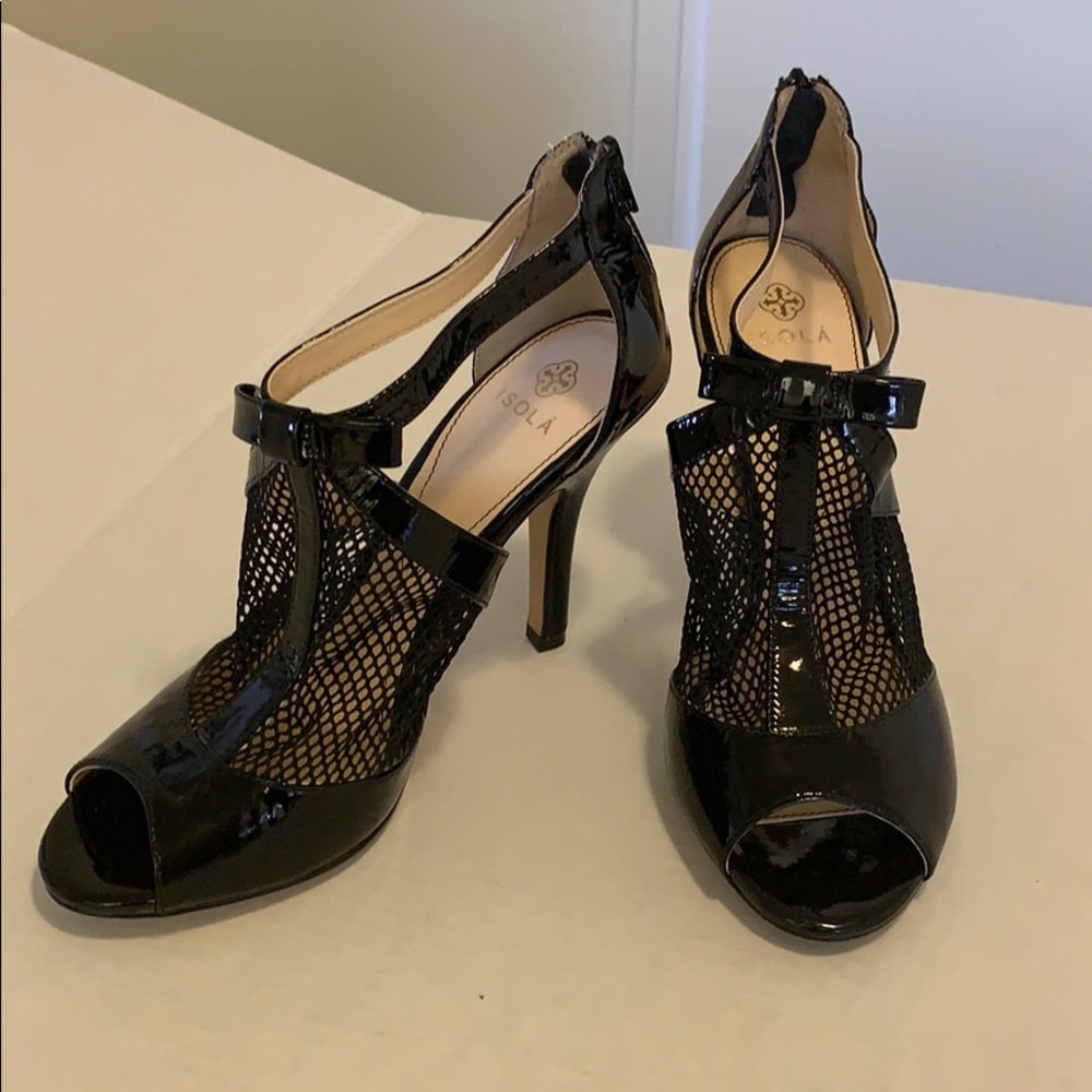 Dressy Isola patent leather sandals.